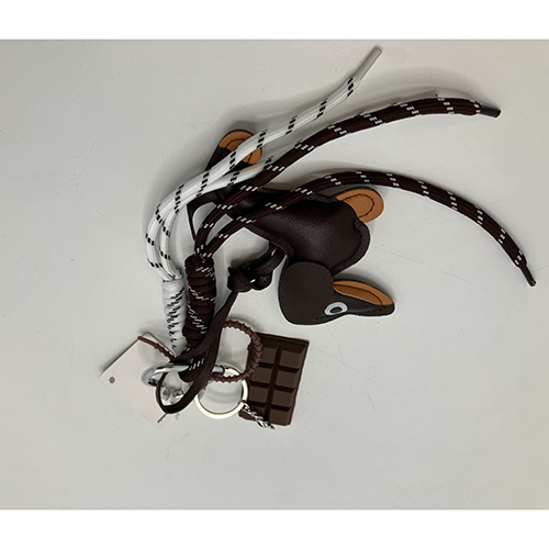 Mobello — Mobile charm dog with chocolate and laces