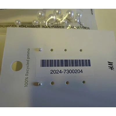H&M — Earrings 100% recycled PMMA