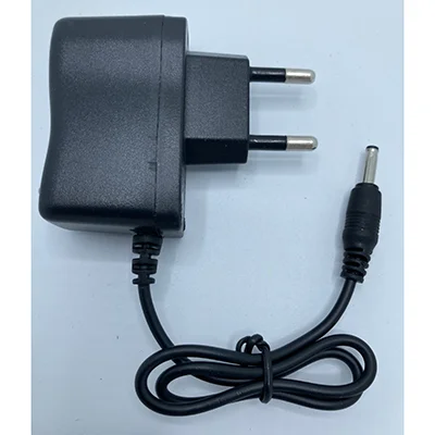 Not specified — Travel charger