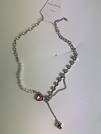 Fashion jewellery — Necklace with heart-shaped pendant and rhinestones