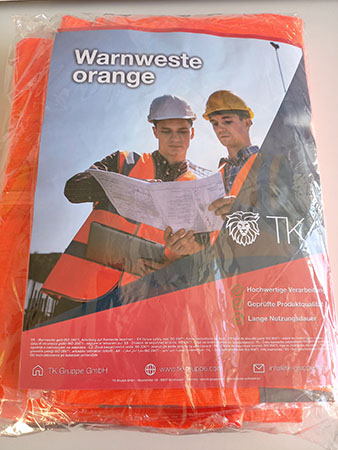TK Gruppe — Warnweste orange