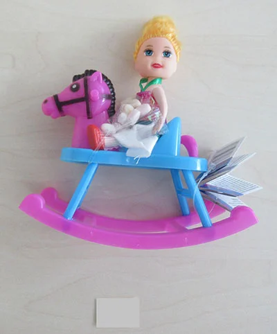 Doll on hobby horse