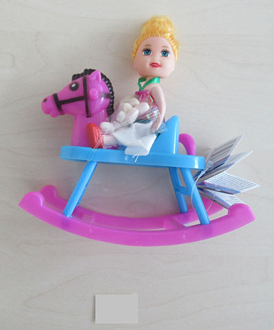 Doll on hobby horse