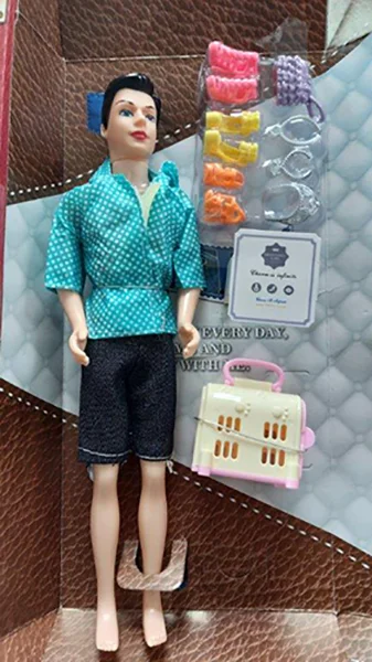 Plastic doll with accessories