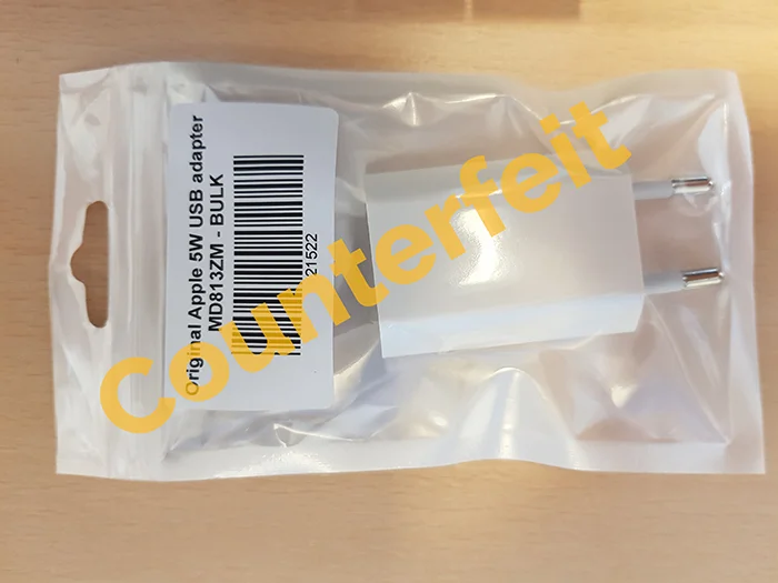 Apple (counterfeit) — Original Apple 5W USB Adapter MD813ZM - BULK