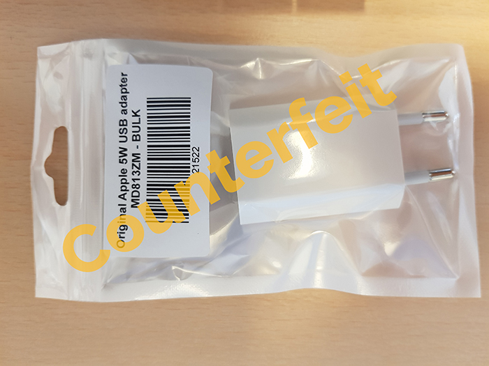 Apple (counterfeit) — Original Apple 5W USB Adapter MD813ZM - BULK
