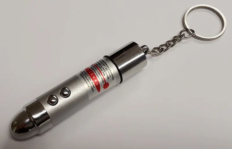 Shock LASER flashlight; Vicces játék