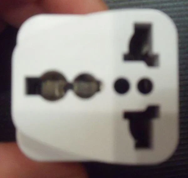 AS — Travel plug adapter