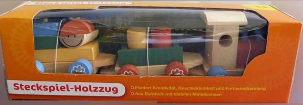 Qsource — Steckspiel-Holzzug ('Peg-in-hole wooden train')