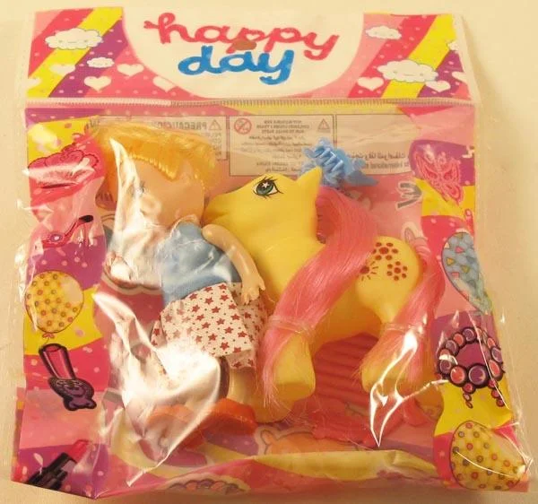 Happy day — Plastic doll and pony
