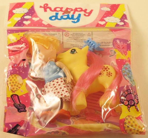 Happy day — Plastic doll and pony