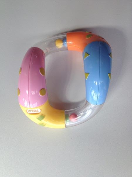 1) Tolo, 2) Tolo / Marks and Spencer (M&S) — Twist & Turn Rattle