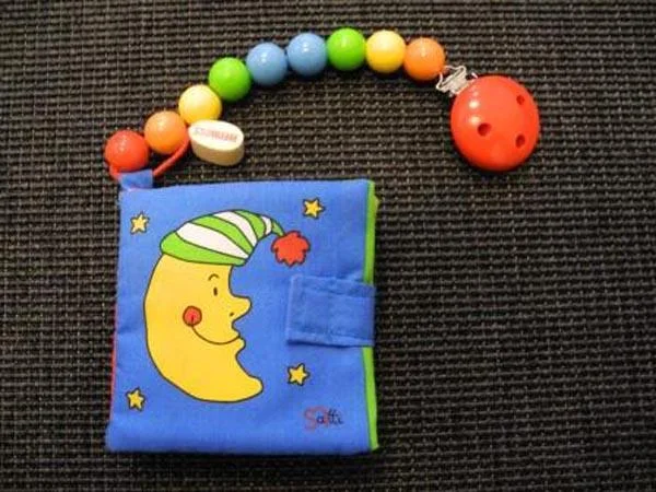 Heimess — Cloth picture book with sootherchain