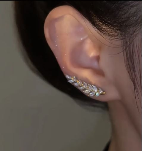 sans marque — boucles d'oreilles en métal et strass en forme de feuille