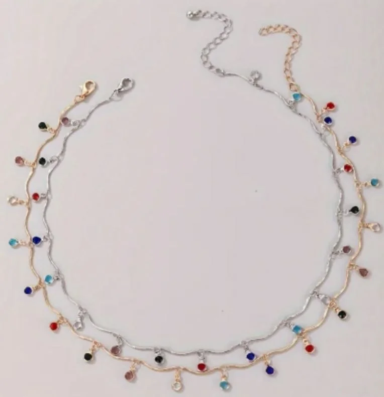 sans marque — collier en alliage doré ou argenté avec pendentif en franges et strass bohème