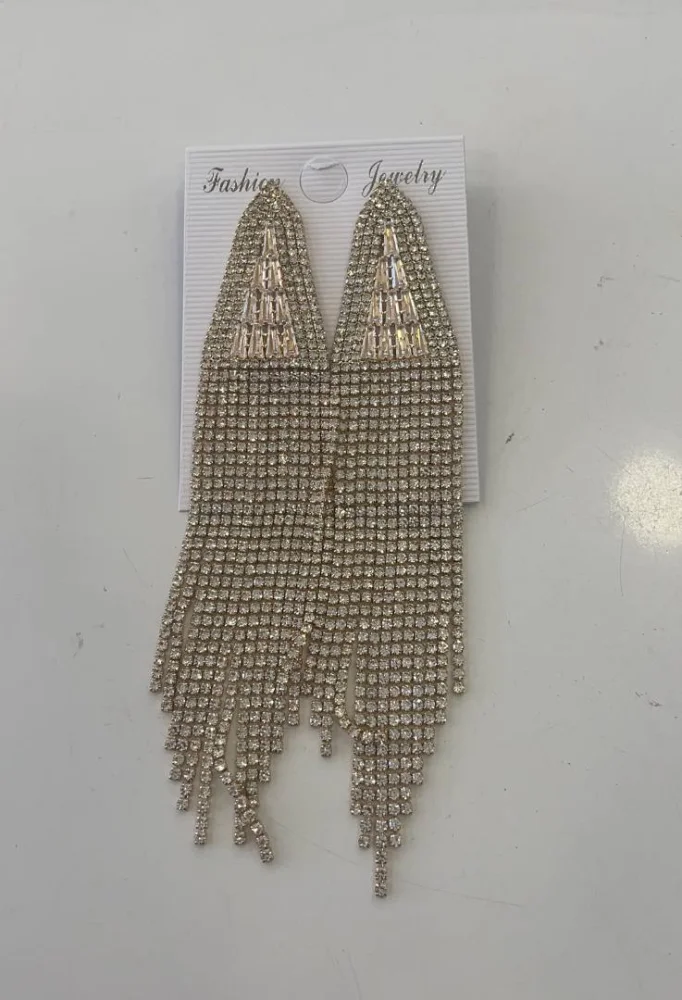 sans marque — boucle d'oreille collé d'une etiquette tez17579
